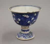 A Chinese Kangxi blue and white porcelain stem cup. 11.5 cm high.