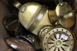 A quantity of metalwares, including brass watering cans. The largest 48 cm high.