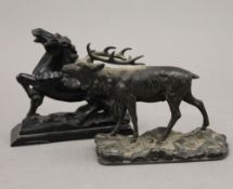 A Victorian cast stag and a carved horse