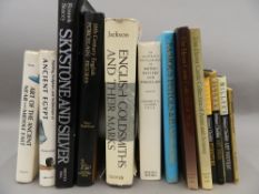 A quantity of antique reference books