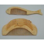 Two bone combs. The largest 10 cm wide.