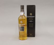 A single bottle of Glen Grant Single Malt Scotch Whiskey,