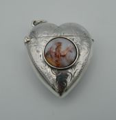 A silver and enamel heart shaped vesta