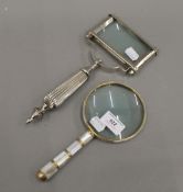 Two magnifying glasses. The largest 27 cm long.