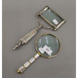 Two magnifying glasses. The largest 27 cm long.