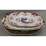 A quantity of Masons and other Ironstone meat plates. The largest 50 cm wide.