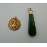 An Edwardian engraved rose gold and jade pendant, together with a St. Christopher pendant.