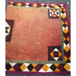 A Victorian/Edwardian patchwork quilt