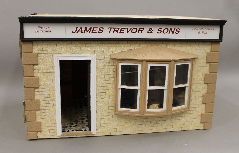 A wooden butchers shop model