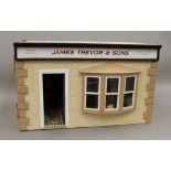 A wooden butchers shop model