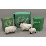 Three boxed Beswick sheep