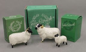 Three boxed Beswick sheep