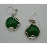 A pair of silver and jade earrings