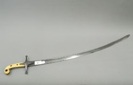 A 19th century Mameluke sword, with an ivory handle. 89 cm long.