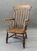 A Victorian splat back armchair.