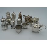 A quantity of various silver cruets. (13.