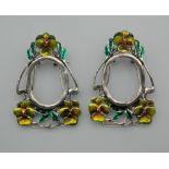 A pair of small silver and enamel Art Nouveau style frames. 4.5 cm high.