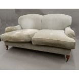 A Howard style upholstered settee. 165 cm wide.