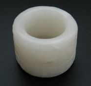 A white jade archers ring. 2.5 cm high.