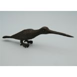 A Japanese bronze model of a long beaked bird. 13.5 cm long.