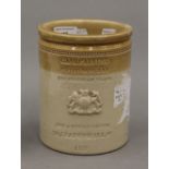 A 19th century crested stoneware storage jar.