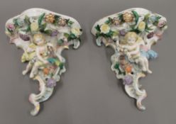 A pair of 19th century Continental porcelain wall brackets