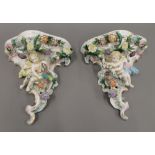 A pair of 19th century Continental porcelain wall brackets