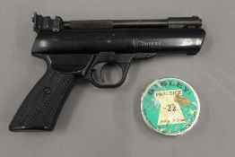 A Webley Tempest air pistol and pellets