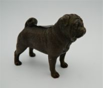 A bronze model of a pug. 6 cm high.