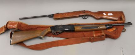 A Crosman air rifle in slip, together with another air rifle. The latter 93 cm long.