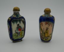 Two Chinese snuff bottles. The largest 6.5 cm high.