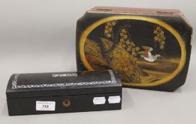 A mother-of-pearl inlaid glove box, together with a lacquered box. The former 23 cm wide.