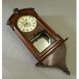 A 19th century Bisto advertising walnut cased drop dial wall clock. 89 cm high.
