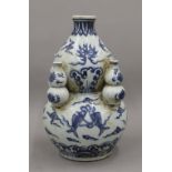 A Chinese blue and white porcelain double gourd vase. 26.5 cm high.