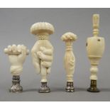 Three 19th century ivory seals and a bone seal. The tallest 12 cm high.