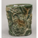 A Chinese carved jade brush pot, the reverse signed. 15.5 cm high.