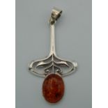 An Art Nouveau style silver pendant. 5.5 cm high.