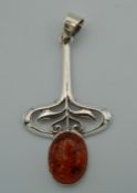 An Art Nouveau style silver pendant. 5.5 cm high.