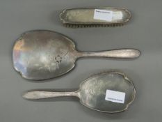 A Goldsmiths & Silversmiths Company Ltd, 112 Regent St London silver three piece dressing set.