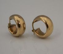 A pair of 9 ct gold hoop earrings. (2.