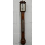 An Edwardian Negretti and Zambra inlaid mahogany stick barometer. 95 cm high.