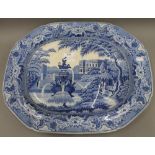 A large 19th century blue and white porcelain meat plate. 51.5 cm wide.