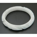 A white jade bangle. 7 cm diameter.