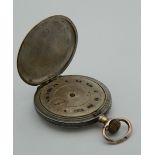 A niello cased pocket watch. 4 cm diameter.