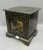 A small chinoiserie lacquered cabinet. 30 cm wide.