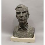 A bronze effect fibre glass male bust on stone display plinth,