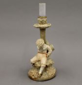 A Royal Worcester figural lamp base. 26.5 cm high.