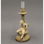 A Royal Worcester figural lamp base. 26.5 cm high.