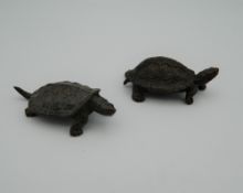 Two Japanese bronze models of tortoises. The largest 5.5 cm long.