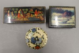 A late 19th/early 20th century Kashmiri box and two Russian lacquered boxes. The largest 16.